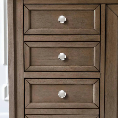 Top Shelf 10 Pack 1-1/4 Inch Heavy Duty Solid Round Cabinet Knobs Polished Nickel on wooden dresser drawers.