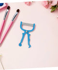 Portable Facial Hair Remover Spring Tool For Women, Manual Epilator With Stainless Steel Coils And ABS Construction, Gentle On Chin And Facial Areas, On The Go Hair Removal For Smooth Skin. Blue handheld facial hair remover with metal spring on pink background.