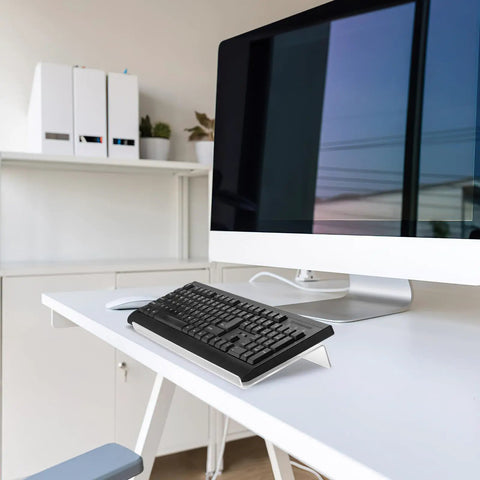 Two Pack Tilted Keyboard Stand In Clear Acrylic For Ergonomic Typing shown on desk setup with computer monitor