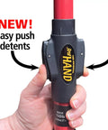 Close-up of hand gripping Upper Hand 3H 3rd Hand Support Pole with easy push detents for woodworking and assembly.