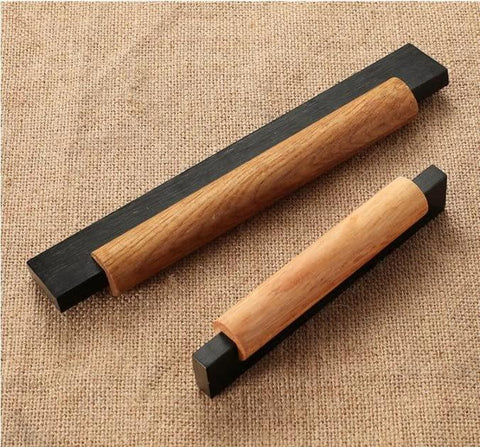 Eight Pack Black Wood T Bar Drawer Pulls for Cabinets Wardrobe Kitchen Dresser Hardware, black and natural wood handles on burlap surface