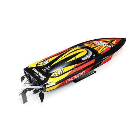 Sonicwake V2 36 Inch Self Righting Brushless RC Boat, Deep-V hull, black with red accents, water-cooled ESC motor, side view.