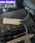 Heavy Duty Oil Extractor Pump With 5V Portable Electric Fluid Siphon and Extended Hose on car engine for fluid transfer.