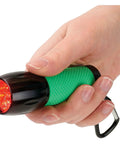 Hand holding RedSight Red LED Flashlight For Reading Astronomy Star Maps And Preserving Night Vision With Two Brightness Settings XL Glow Grip
