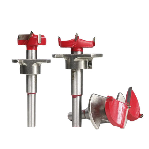 No Sweat Adjustable Wood Hole Cutter Forstner Drill Bit Set With Carbide Tipped Boring Tool 15 To 35 Millimeter Range, three bits showing red carbide tips and silver steel shafts.