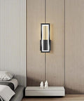 Sleek Rectangular LED Wall Sconce Delivering Flat Out Stunning Three Tone Lighting And Smooth Acrylic Glow To Elevate Any Hallway Bedroom Corner With Zero Effort Chic Vibes mounted on a textured wall beside a bed.