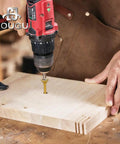 Using a drill to install Two Hundred Pack Size Six By One Inch Yellow Flat Head Deck Screws T10 Torx Drive on wood.