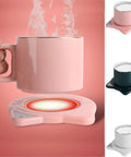 Keep Your Daily Grind Toasty With This Rapid Heating Desk Coffee Warmer featuring a pink mug and matching coaster, steaming coffee highlighted.