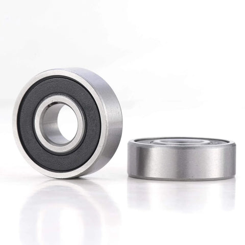 Two silver metal ball bearings with black rubber seals; 1 in bore, 2 in outer diameter, 1/2 in thick