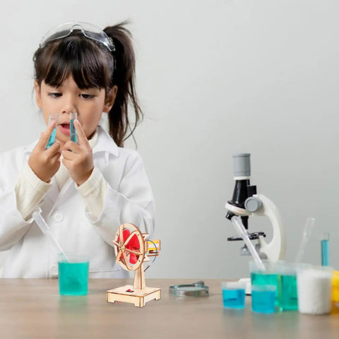 Child with science experiment setup and Hands On DIY Electric Fan Assembly Kit For STEM Classrooms And Science Projects