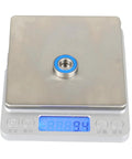 One Set Of 10 6900 2RS Bearings ABEC 5 Precision on scale showing weight, pre lubricated double rubber seals, 10x22x6mm.