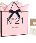 13 Inch Birthday Gift Bag Set With Card Envelope Ribbon Bow And Tissue Paper For Women And Girls Handles Includes Greeting Card Milestones From 13th To 100th, featuring a pink gift bag with black ribbon and greeting card.