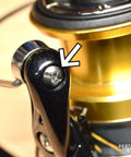 Close-up of screw on Nexave Fi Line Roller Bearing Upgrade Kit for 21 Nexave Fishing Reels with arrow pointing to detail.