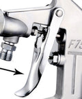 Close-up of Pneumatic Paint Spray Gun With 400ML Aluminum Cup showing the trigger mechanism and nozzle connection.