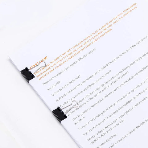 Sturdy 0.75 Inch Binder Clips For Papers And School Projects holding paper, heavy duty steel, reusable office clips for organizing documents.