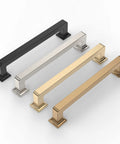 Four cabinet handles in black, silver, gold, and champagne bronze finishes displayed on a white background.