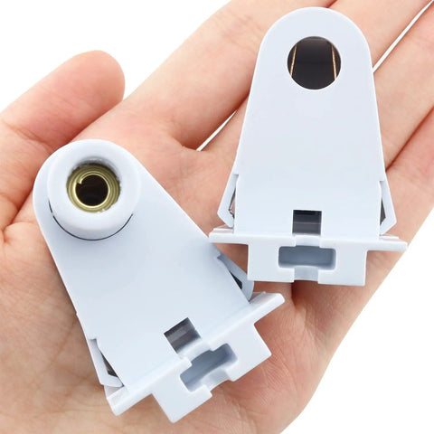 No Fuss T8 Tombstone Sockets 2 Pack White Non Shunted Lampholder Connectors held in hand for fluorescent fixture upgrades.