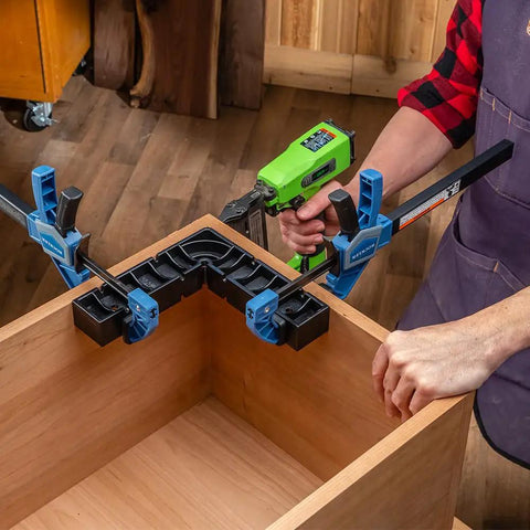 Person using One Handed 10 Inch Bar Clamp With Spring Loaded Trigger Grip on wooden assembly