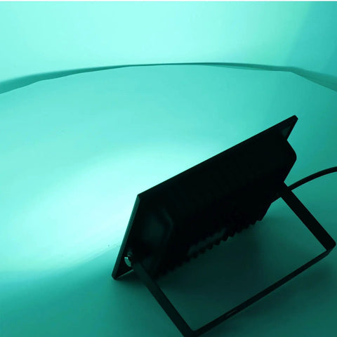 SUNGOOYUE LED Flood Light RGBW Color Changing illuminated in green, showcasing sleek aluminum design and stand.
