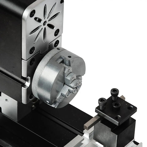 Close-up of Smooth Operator Mini Metal Lathe Boasting A Sixty Watt Motor Running Up To Twelve Thousand Rpm and Fifty Millimeter Center Height for detailed machining on metals and plastics.