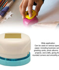Handheld durable metal hole punch for paper crafting DIY embossing, ideal for business cards and scrapbooking with clean cuts, shown in use.