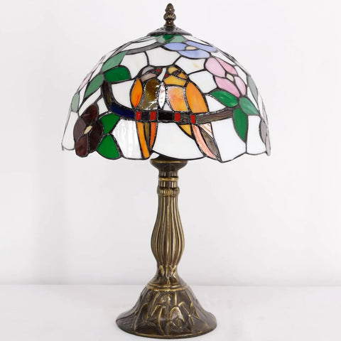 Tiffany Style Stained Glass Table Lamp With Dope Double Tropical Birds, Bedside Desk Reading Light For Bedroom, Living Room And Home Office Decor, 12x12x18 Inches featuring colorful bird motif on antique bronze base.