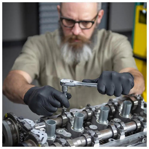 Mechanic using Pro Grade Three Piece Ratchet Set With 1-4 Inch, 3-8 Inch And 1-2 Inch Drives, 120-Position 60-Tooth Teardrop Head