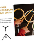 Heavy Duty Folding Drum Rack And Snare Stand Featuring Multi Angle Adjustments And Tight Triangular Brackets Designed For Lightweight Portable Percussion Practice Gear That Holds Up Legit At Home Or On The Go, with a close-up of hands playing on a drum pad.