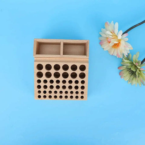 Leather Tool Holder With 48 Holes Wooden Craft Tool Stand Beech Wood Rack Organizer against blue background with flowers