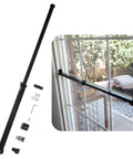 Heavy Duty Sliding Door Security Bar With Child Proof Anti Lift Lock And No Sweat Setup For Adjustable Patio And Window Defense Up To Fifty One Inches Black Steel Bar mounted on a sliding door.