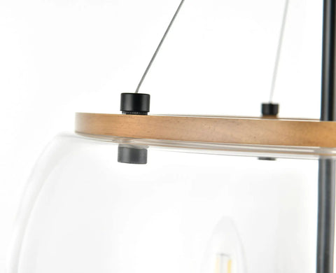 Close-up of wood accent and clear glass shade on Orono 3 Light On Trend Modern Farmhouse Black Pendant Ceiling Light