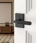 Black Privacy Door Handle Set With Keyless Interior Lock installed on a white door, featuring an easy privacy button for bedrooms.