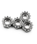 Four K-Lock Nuts With External Tooth Washer 10-32 Stainless Steel Kep Lock Nuts in close-up view.