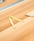 Beefy Heavy Duty Box Lid Support Hinges Gold Tone Iron Folding Hinges 10 Pack With Reliable Mechanism on wooden surface
