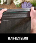 Hands stretching Heavy Duty Tough As Nails Weed Barrier Fabric 3 Ft By 50 Ft Ground Cover For Garden Beds And Mulch, 3.2 Oz Woven Landscape Cloth