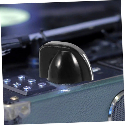 Close-up of black knob from 12 Piece Chicken Head Potentiometer Knob Caps Set For Electric Guitar Volume Control And Tone Adjustment Durable Metal Pot Knobs Easy Fit Retro Style Gear Upgrade on amplifier.