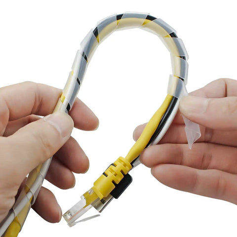 Hands wrapping cable with Clear Spiral Cable Wrap 12mm for Half Inch Cables 20 Ft Long Wrapping Range 9mm To 65mm.