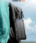 Power Bank 49800mAh Solar Portable Charger With Wireless Charging USB C 15W Fast Charge secured on backpack