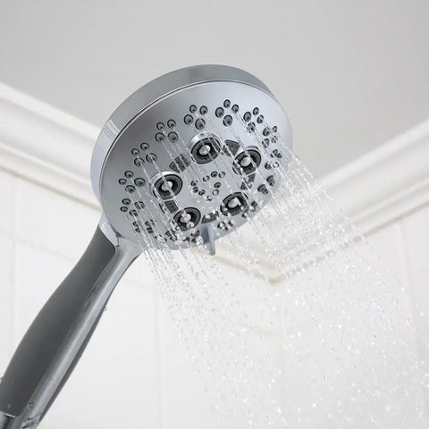 Rio Multi-Function Handheld Shower Head With Hose, Polished Chrome Finish, showing water spray from shower head