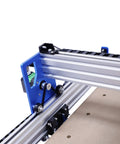 Detail of Badass 3 Axis CNC Router Station With 4040 Woodworking Engraver, showcasing aluminum frame and precision components.