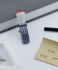 Durable 4 Digit Number Roller Stamp Is A Total Game Changer For Busy Offices And Retail Shops featuring grey adjustable dials.