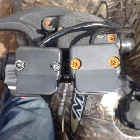 12V Mini Rocker Switch Handlebar Control For ATV And UTV Winches Waterproof mounted beside throttle lever on handlebar.