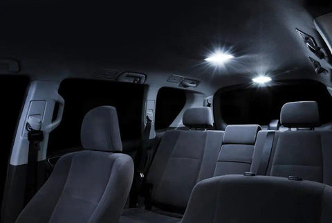 Interior of a car with Pure White Interior LED Kit For Mazda RX-8 2004-2014, 5-Piece Set With Map, Dome, Door, Trunk And License Lights