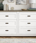White dresser with 10 Pack Matte Black and Champagne Bronze Knurled Cabinet Knobs and Drawer Pulls on drawers.
