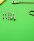 500 Piece Brass Knurled Threaded Nut Insert Kit For Mechanical And DIY Projects Pro Grade Sturdy Brass Embedding Nuts That Prevent Loosening Compatible With Plastic And Metal Parts Organized Storage Case brass inserts laid out with measuring tools