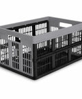 Hella Durable Folding Storage Crate 32L With Grip Handles And Reinforced Bottom in stone gray for organizing groceries.