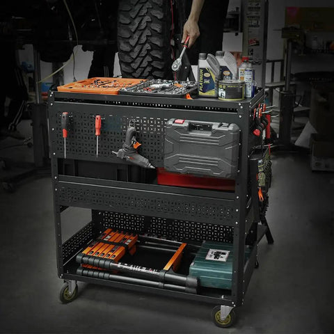 3 Tier Detachable Utility Cart With Steel Pegboard Foldable Rolling Tool Cart On Wheels For Garage Organization And Tool Storage A Real Garage Workhorse Grab And Go Mobile Shop Cart in a garage setting.