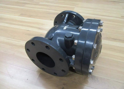 Rock Solid 4 Inch Swing Check Valve Hi PVC Body showing a black 4-inch swing valve with standard flange for plumbing use.
