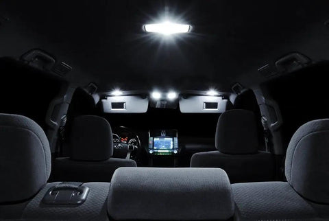 Interior view with Pure White Interior LED Kit For Mazda RX-8 2004-2014, 5-piece set, dome light illuminating car cabin.