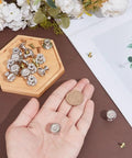 16 Piece Vintage Silver Flower Embossed Drawer Knobs For Kitchens And Dressers Compact Round Metal Pulls With Matching Screws on display with a coin.